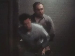 Police spycam in a mensroom of the 50ies