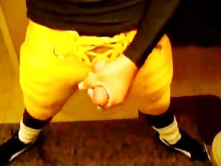 Football player Jack off in uniform