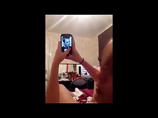 Amateur girl watching porn on her cell