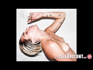 Miley cyrus showing tits playing with dildo insane celeb chick