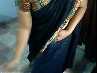 Aunty wearing Saree after session