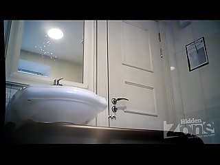 Spy cam in women's toilet - Blonde in black panties