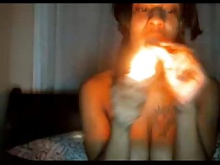 Girl smoking weed on webcam