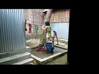 Desi girl bathing outdoor for more visit http sh st 3b8dg
