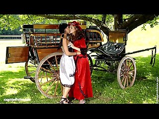Classic period lesbians Juliette and Ashley have fun by the wagon