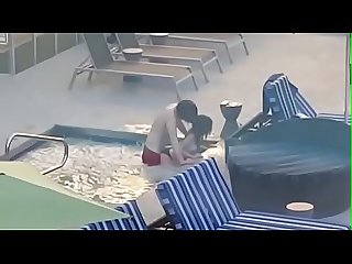Voyeur couple caught fucking in a hotel pool (sneakyvoyeur.com)