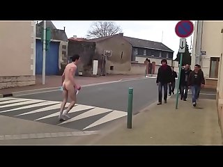 french guy completely naked in public street after loosing a bet