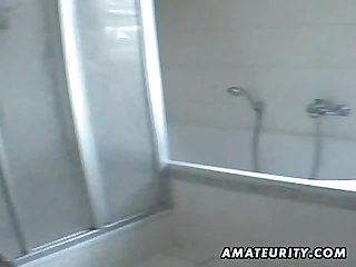 Busty amateur milf sucks and rides in her bathroom