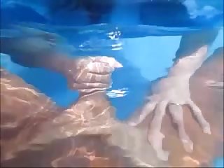 Nasty wife give husband handjob in pool underwater make him cum underwater