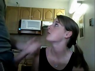 Teen girl blowjob in the kitchen