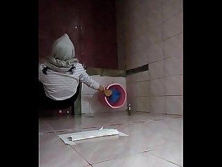Hijab girl on campus toilet