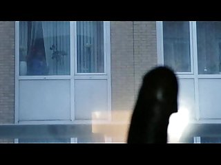 Jerking cock in front of window woman caught and watch