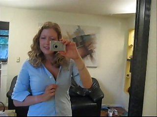 Busty girl next door andy lynn takes picture of herself in The mirror