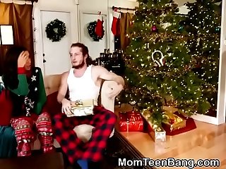 Brunette MILF And Teen Combination Christmas Morning Blowjob