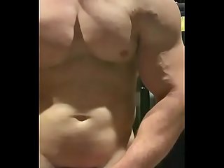 muscle jock flexing, posing, stroking cock & talking s.