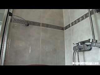 Blonde cougar shaving in the shower blows cock