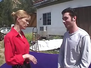 Blonde milf fucked by a young slacker